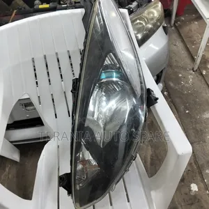 Demio 2012 Headlight