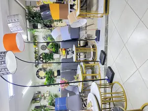 Curved Floor Lamps With Lampshades in Different Colors