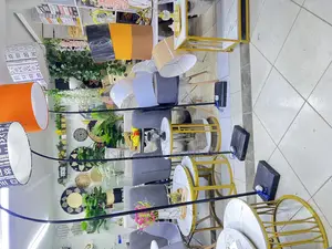 Curved Floor Lamps With Lampshades in Different Colors