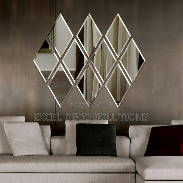 "Faceted Diamond Wall Mirror – Acrylic Accent"