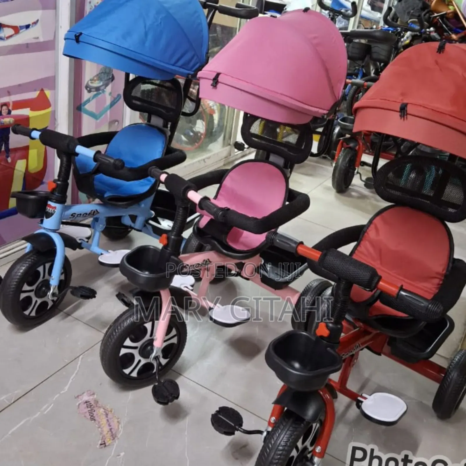 Unisextricycles With Push Handle and a Canopy