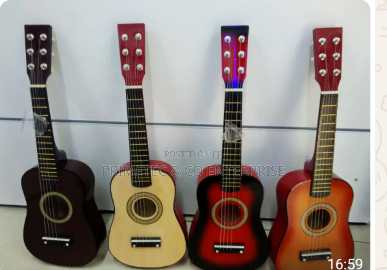 6 Strings Acoustic Guitar
23 Inches Long