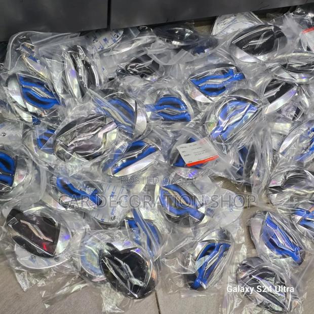 Fielder New Model Grill Colored Logo in Blue or Black - main view