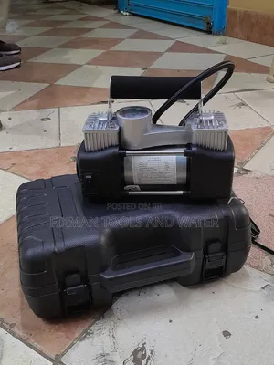 Portable Dc Air Compressor With Puncher Kit Set