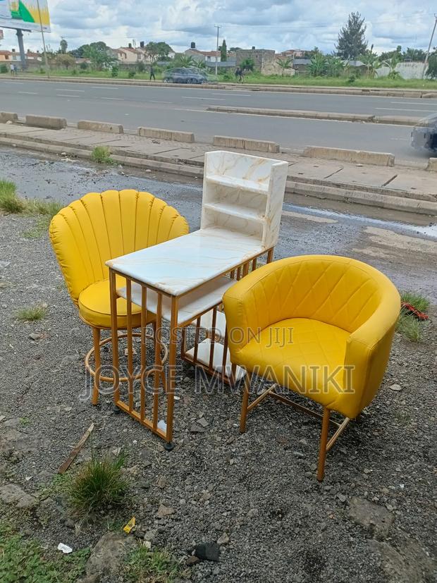 Manicure Set, Yellow Seats and Marble Table - main view