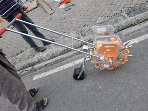 Manual Hand Seed Planter With Fertilizer Applicator.