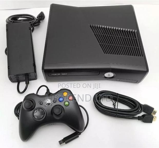 Slightly Used Xbox 360 Chipped With 10 Games - main view