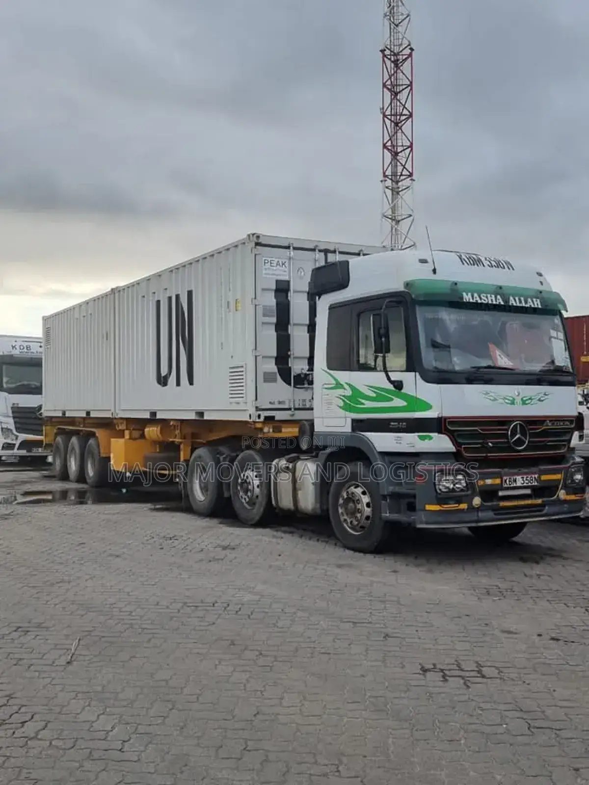 Container. Trailer at Hand for Transport.