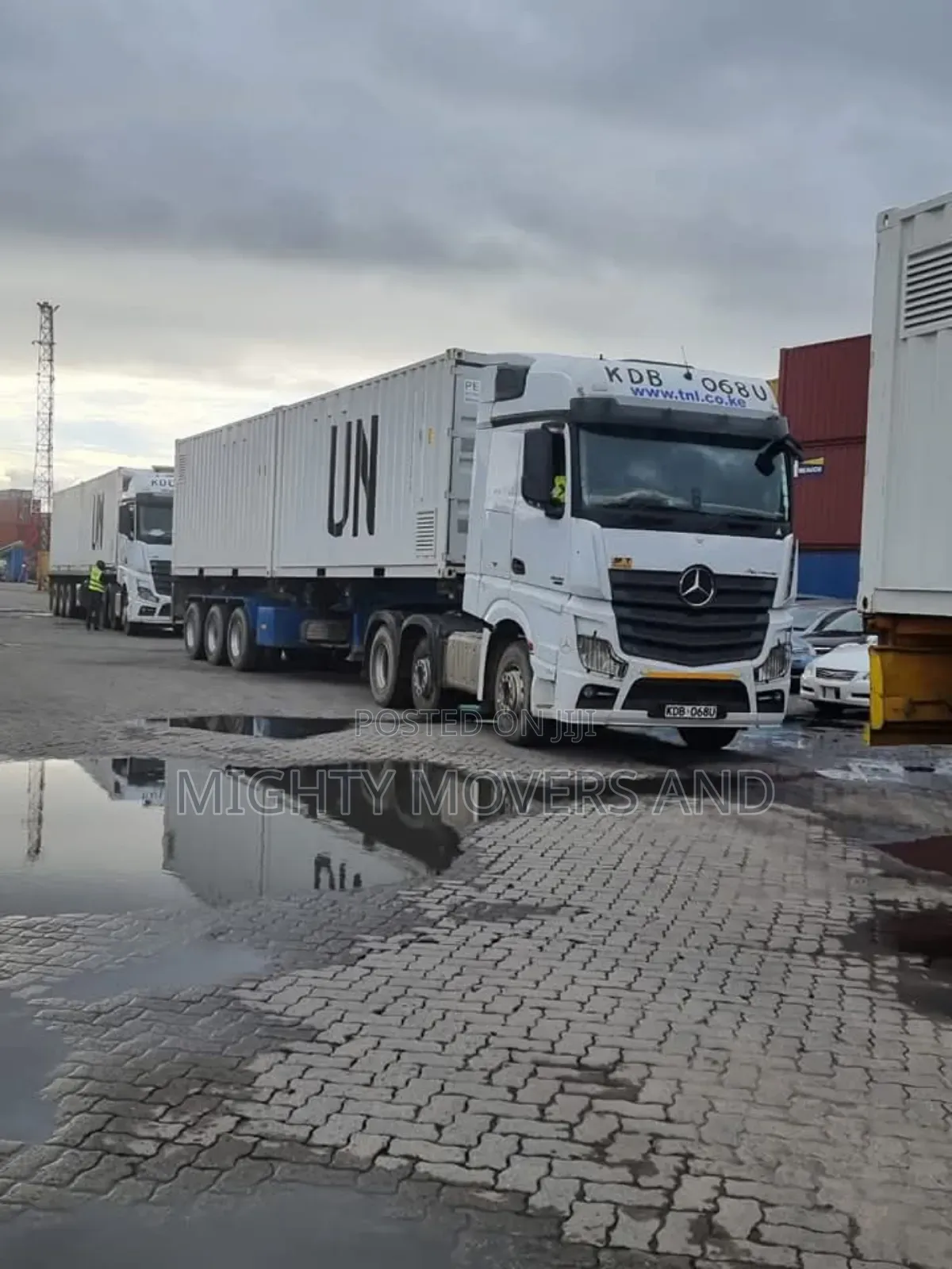 Container. Trailer at Hand for Transport.