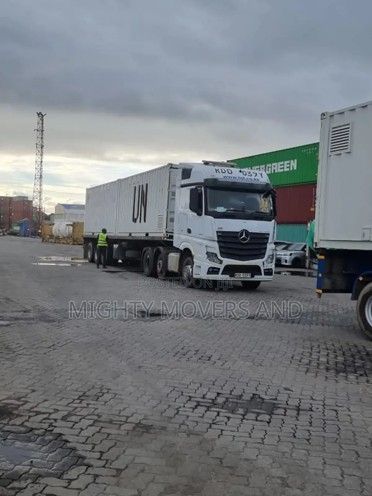 Container. Trailer at Hand for Transport.