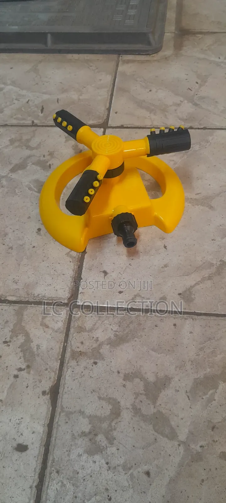 Yellow Water Sprinkler