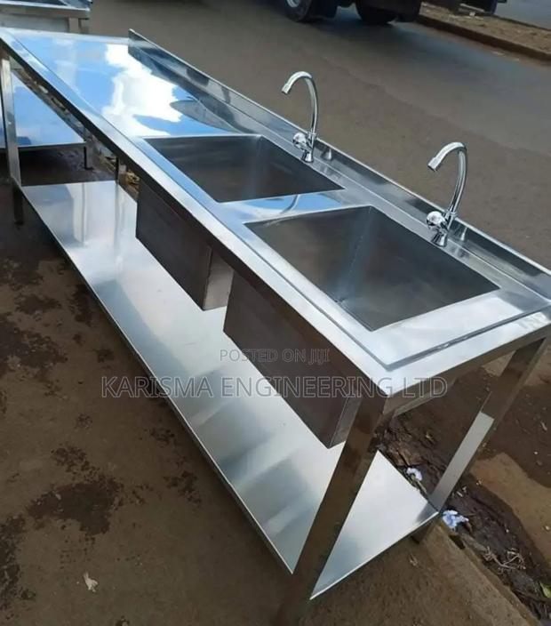 Stainless Steel Double Sink, Two Taps and an Undershelf