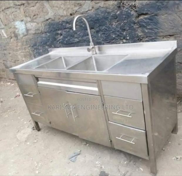 Stainless Steel Kitchen Cabinet, 2 Bowls and a Tap