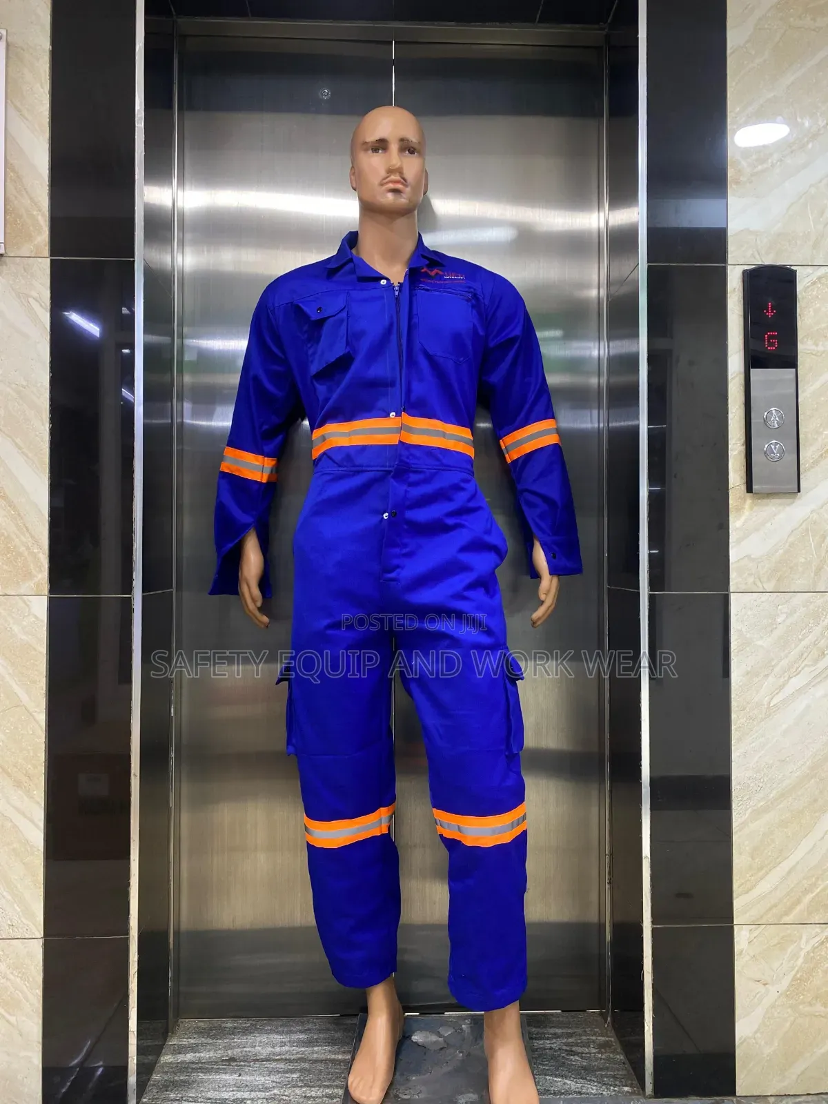 Reflective Overall Branded With Reinforced Cargo Pockets.