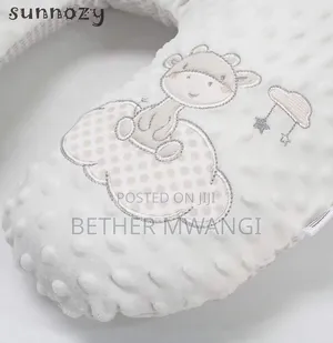 Sunnozy C-Shaped Nursing Pillow in Kenya.