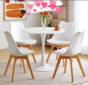 Soft Padded Dining Chairs With White Round Table