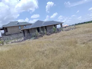 100 by 100 Plot for Sale With Ready Title Deed