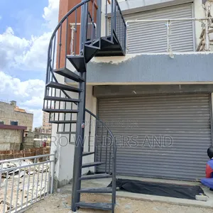 "Climb With Confidence – Modern Steel Spiral Stairs"