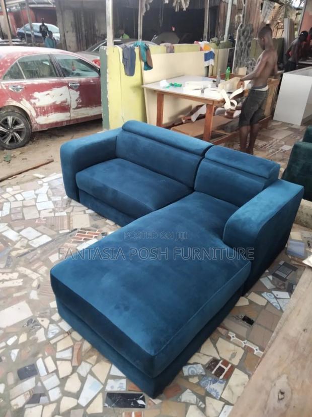 Blue L-Shaped Sofa With Contemporary Lines. - main view