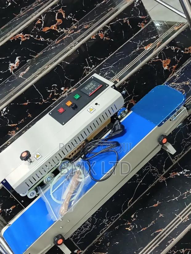 Food Packaging Cutting and Sealing Machine - main view