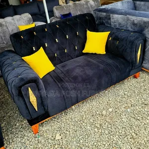 Bold Black Velvet 2 Seater Sofa and Yellow Cushions