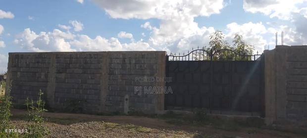 40 by 60 Plot With Perimeter Wall, Gate and Water - main view