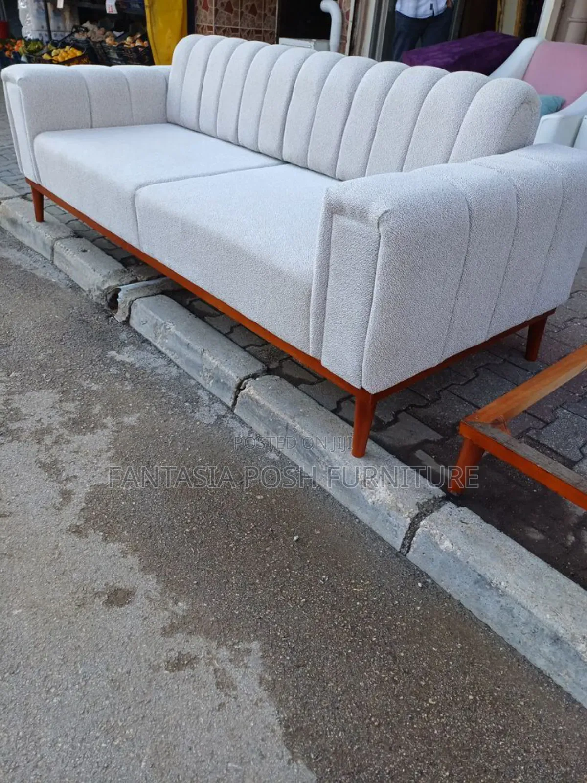 Modern 3 Seater Sofa With Tufting and Wooden Base