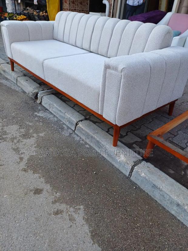 Modern 3 Seater Sofa With Tufting and Wooden Base