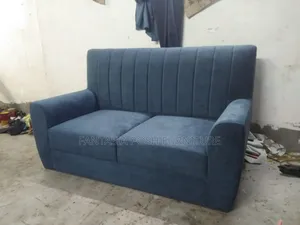 Deep Blue Two-Seater Sofa With Vertical Stitching