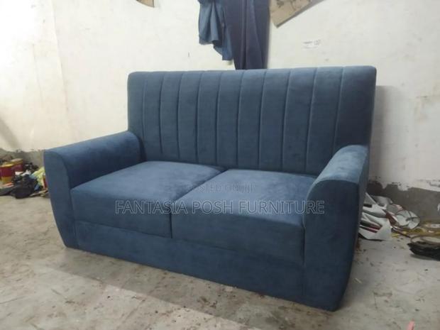Deep Blue Two-Seater Sofa With Vertical Stitching - main view