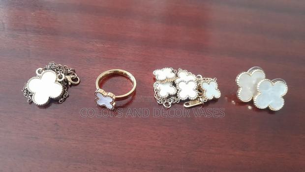 Flower Ring, Bracelet, Necklace and Earrings