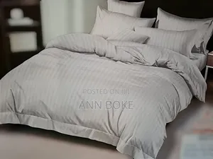 *Cotton Stripped Duvet Cover.* Size: 6x7 Pillowcases: