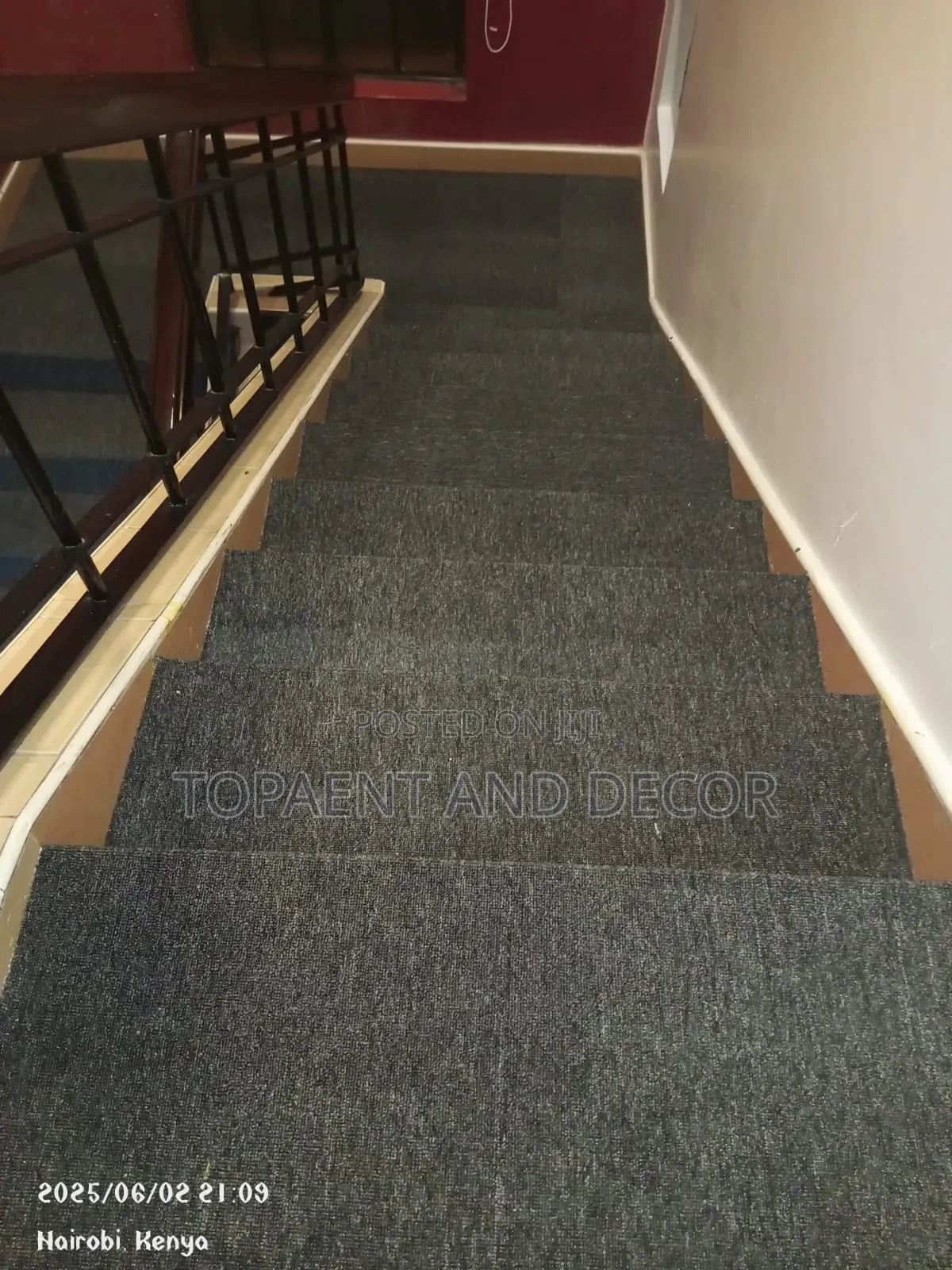 Hotel Corridor Designed With Grey Wall to Wall Carpet