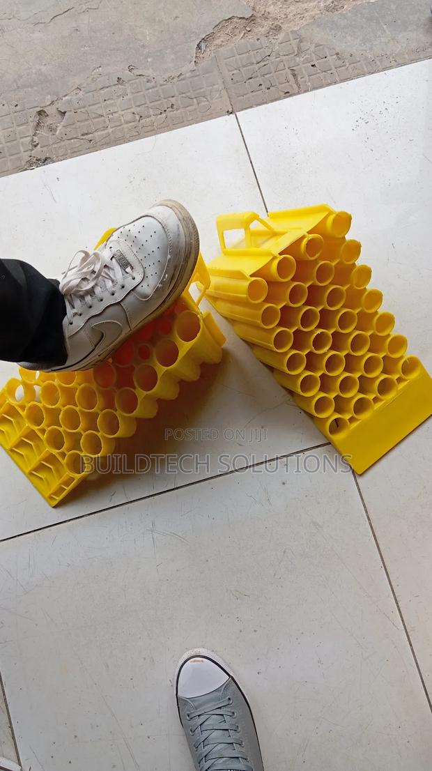 Affordable Yellow Plastic Wheel Chocks - thumbnail 2