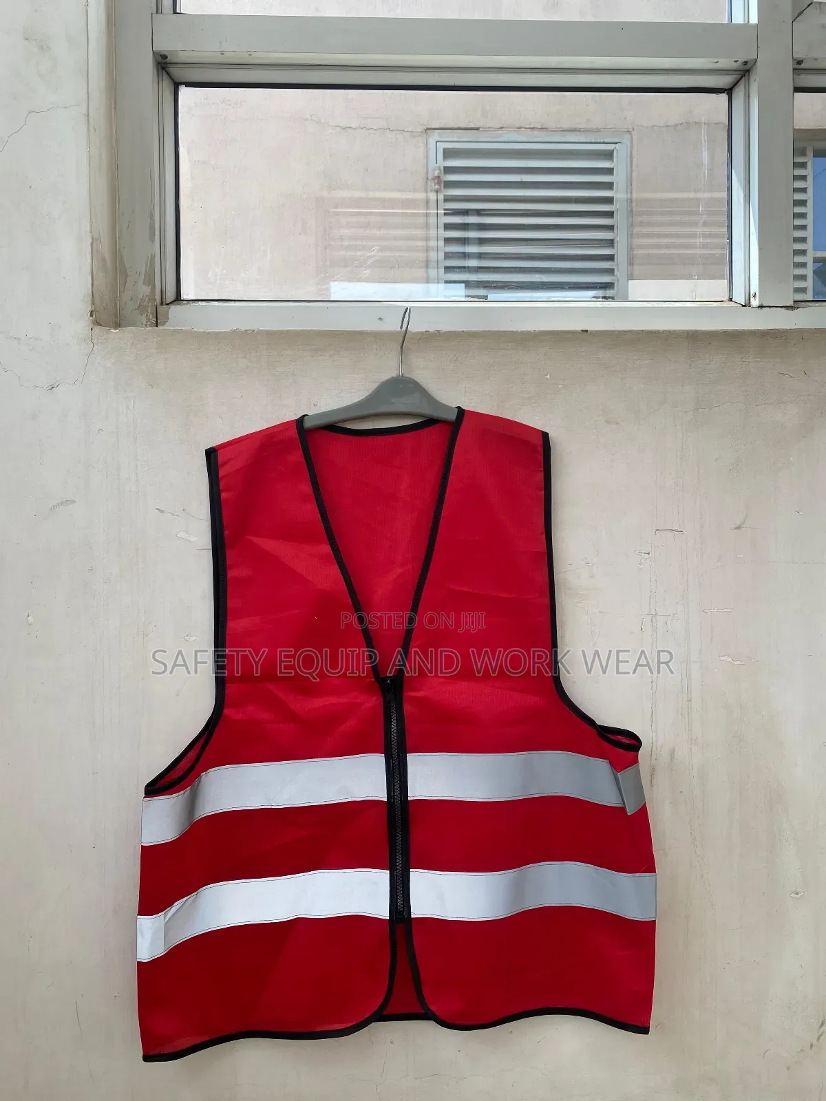 Red Zipped Reflectors With A Front Zipper