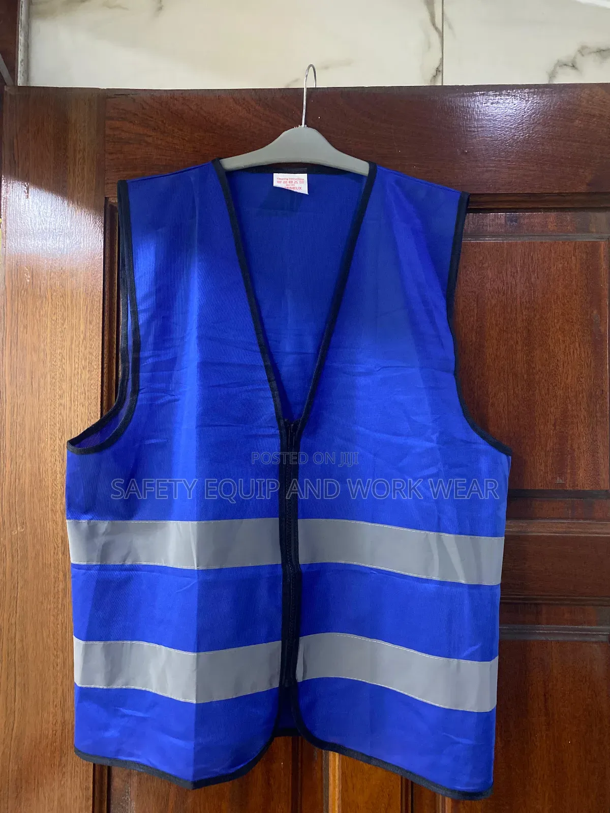 Blue Zipped Reflector For Construction And Road Safety.