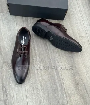 Official Leather Clarks Shoes Dark Brown in Color