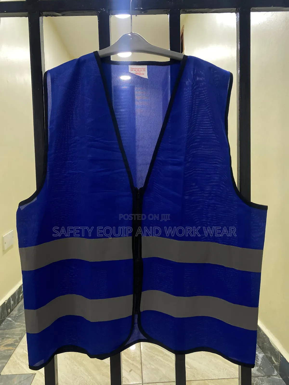 Blue Zipped Reflector With Glow Technology