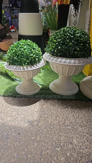 Ball Flowers and Plastic Vase