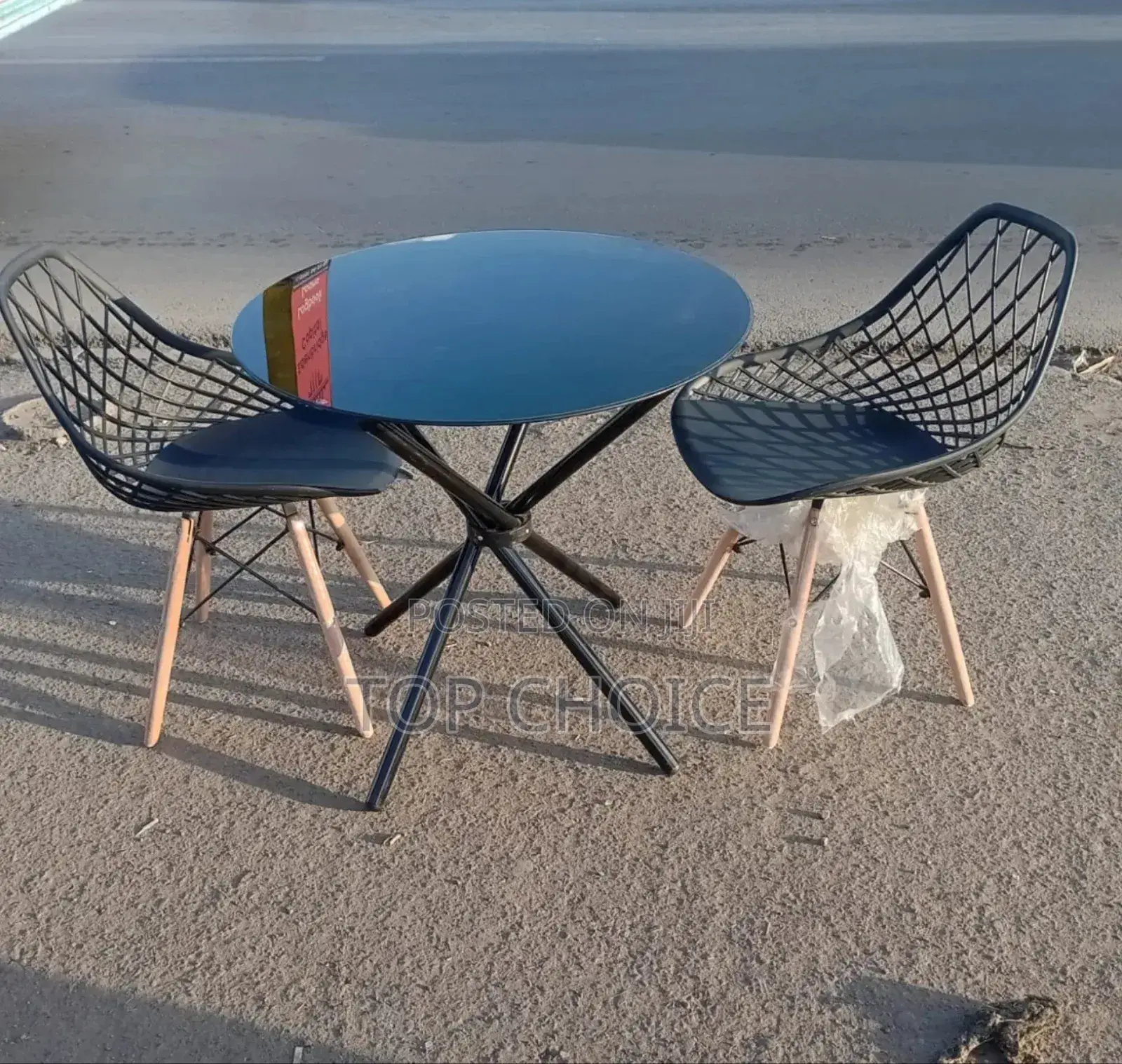 Black Table and Aemes Chairs