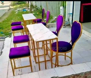 Manicure a Set of Seating Stools and a Table.