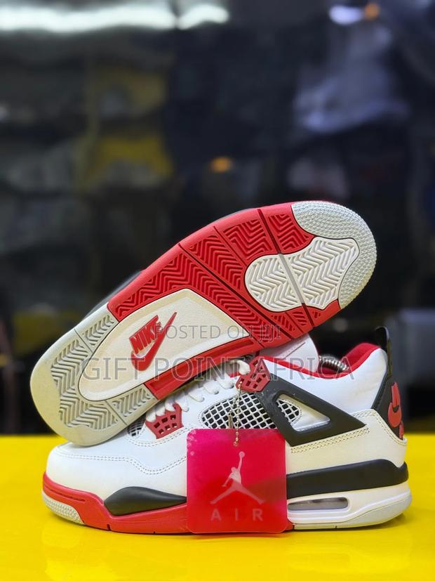 The Air Jordan 4 Retro “Fire Red” - main view