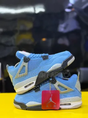 The Air Jordan 4 Retro “University Blue” Sneakers