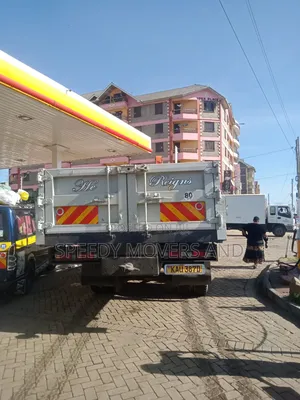 Mguu Kumi Truck With Crane Available for Transport