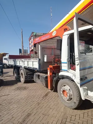 Mguu Kumi Truck With Crane Available for Transport