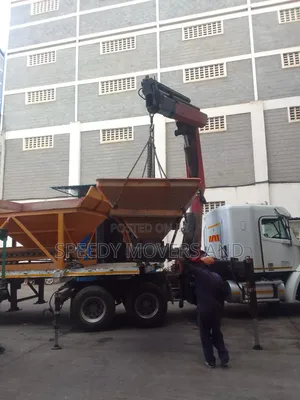 Flatbed Trailer With Crane Available for Lifting