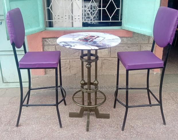 Bar Set, Unique Table and 2 Purple Chairs.