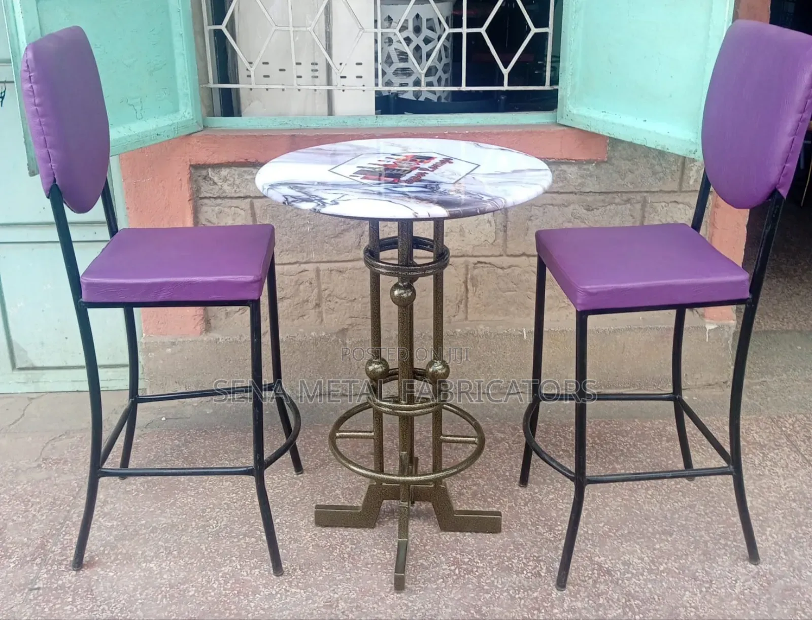 Bar Set, Unique Table and 2 Purple Chairs.