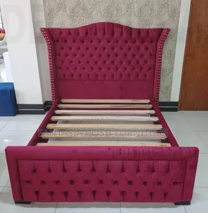 Elegant Burgundy Tufted Bed Frame With Wingback Headboard