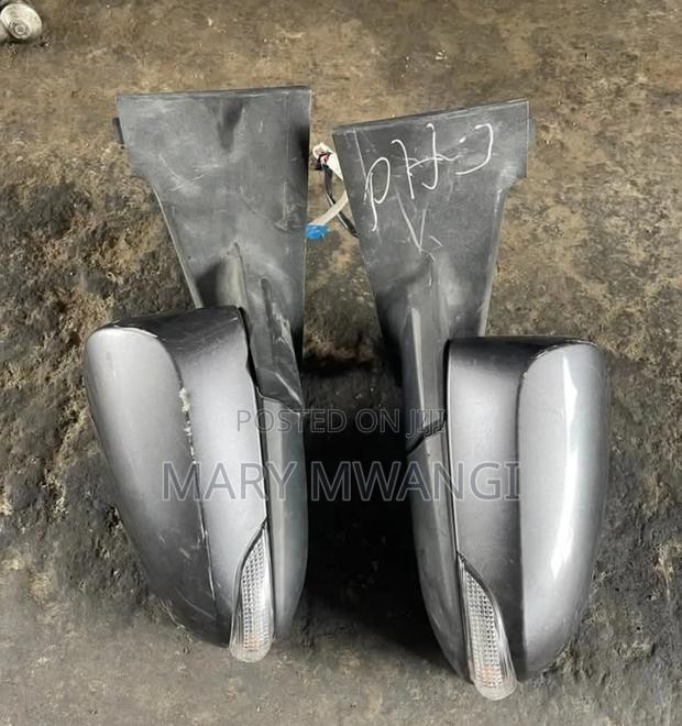 Toyota Vitz 2012-2015 Side Mirror With Indicator - main view